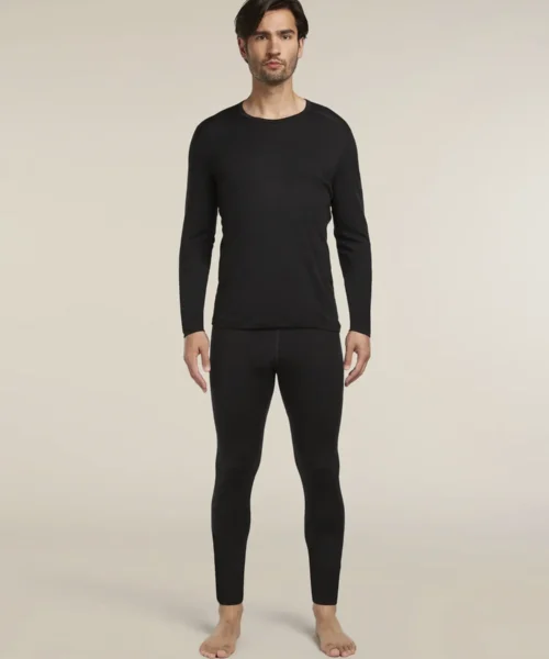 Icebreaker Men's Merino 200 Oasis Leggings -aluskerrastohousut mallin päällä koko kerrasto - black